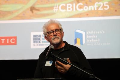 Tadhg Mac Dhonnagáin accepting the CBI Award 2025
