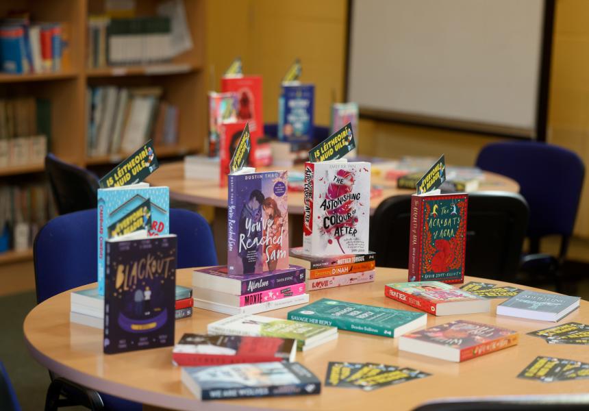 Display of books on table as part of book-gifting projects