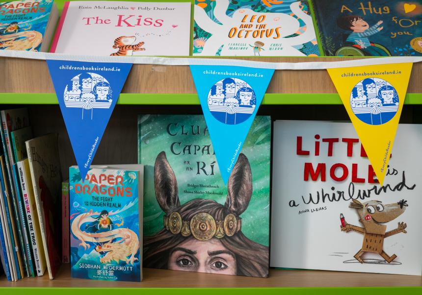Children's Books Ireland bunting strewn across bookshelves 