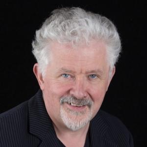 Headshot of Tadhg Mac Dhonnagáin